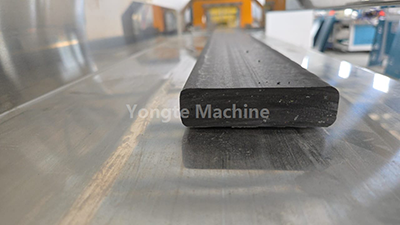 Recycled plastic lumber machine