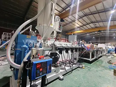 Recycled plastic lumber machine