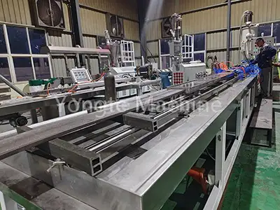 Recycled plastic lumber machine